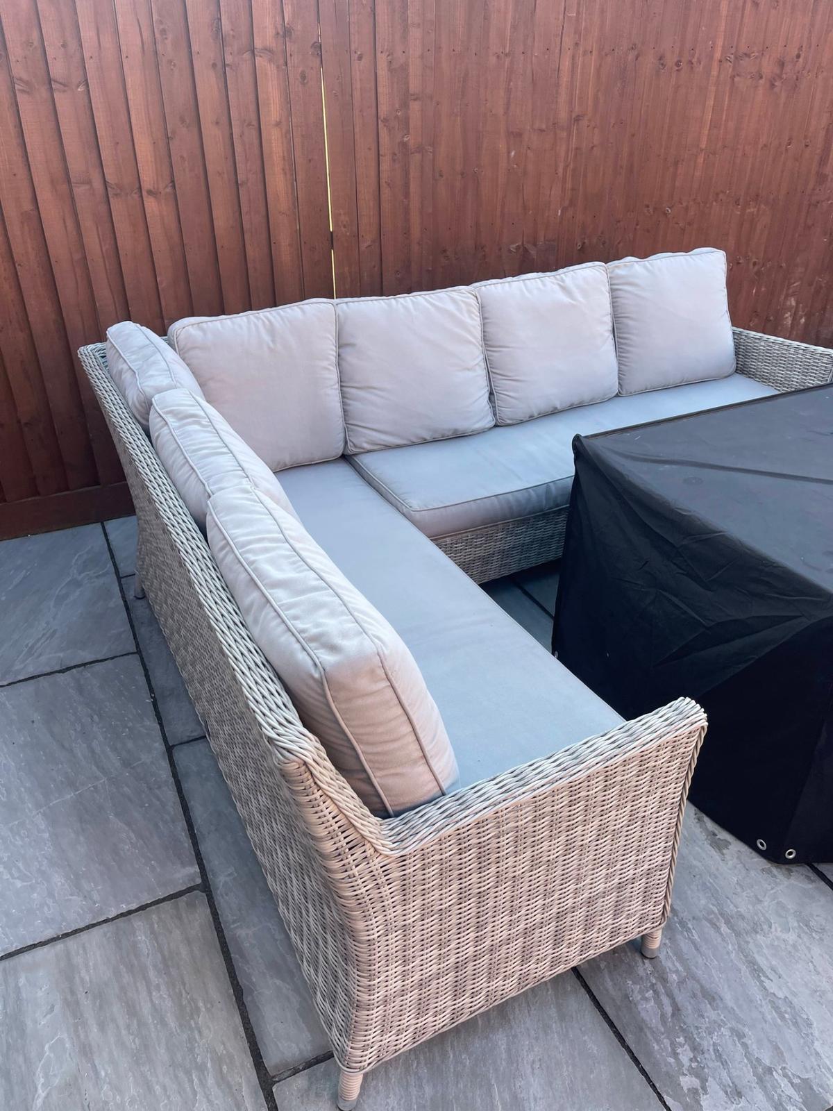 Outdoor garden sofa professionally cleaned and restored