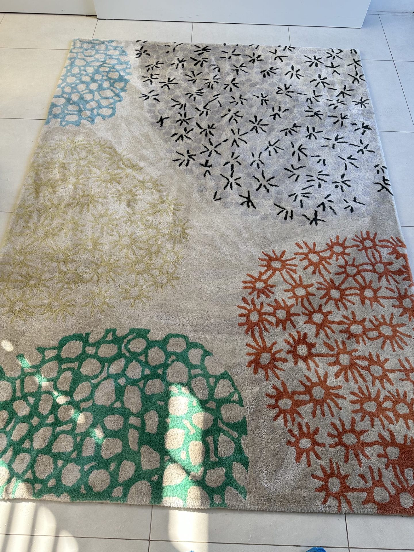 Colourful patterned rug professionally cleaned with vibrant colours restored