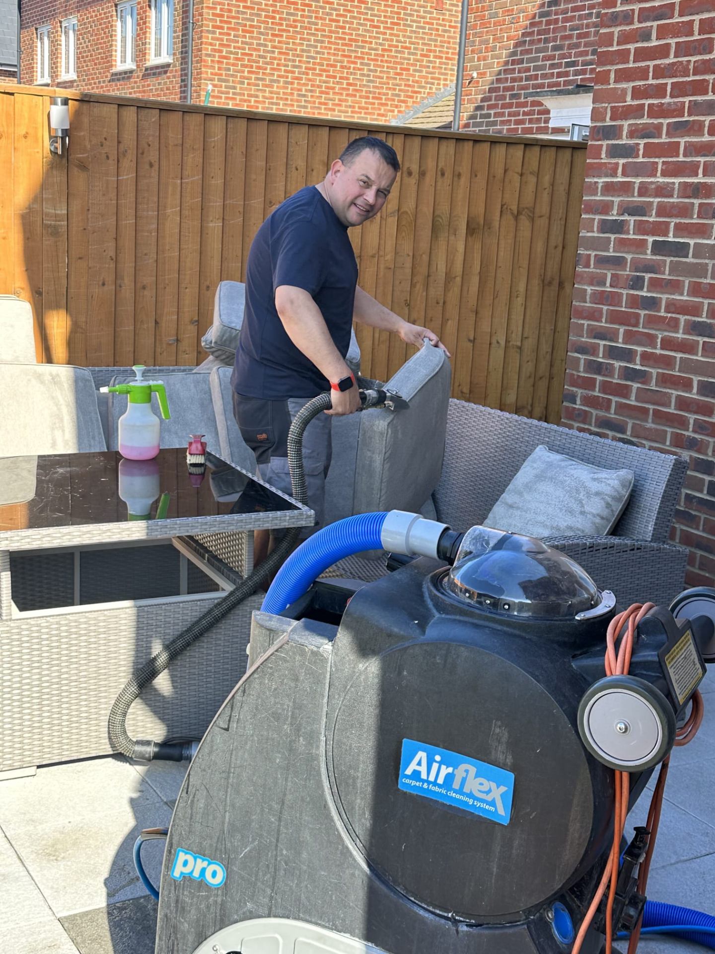Wayne from Kingsbrook cleaning outdoor furniture with Airflex professional equipment